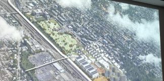 Rendering of residential towers and mixed industrial maker space with proposed salt water marsh. BE 405/505 project group “Urban Assemblage.”