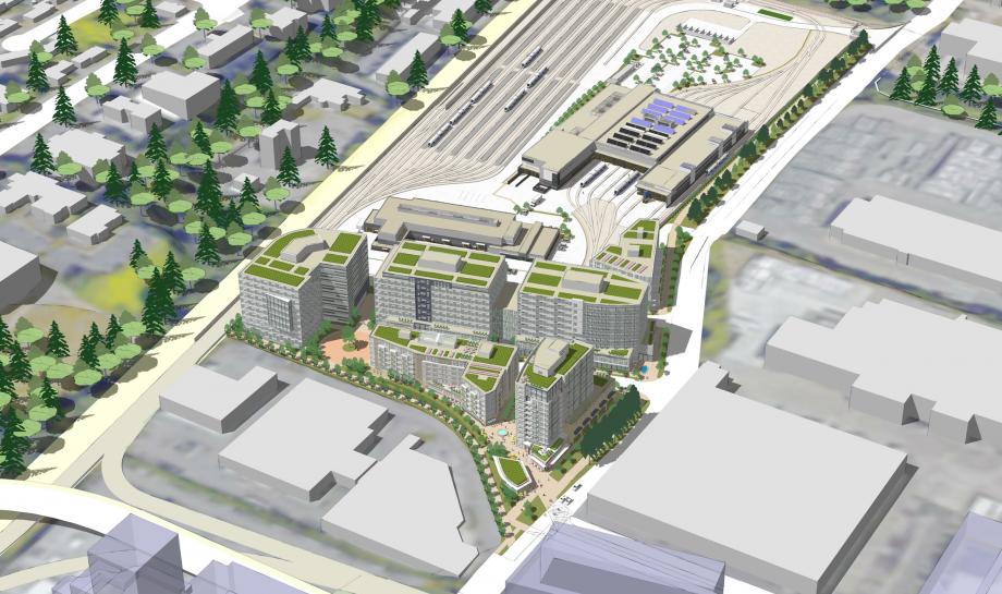Rendering of the TOD site and OMF East shows six mid-rise buildings plus the light rail facilities. (Sound Transit)