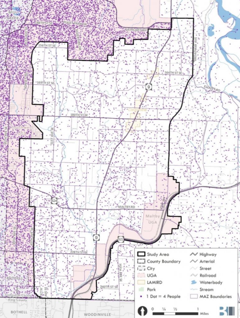 Population density map showing clusters of purple dots coming to the west and north sides of the area. The thickest dots stop at the growth boundary. Purple dots continue evenly from inside the study area and further east.