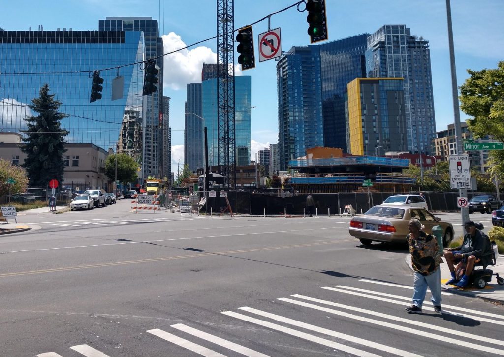 Many intersections already have red light cameras and many school zones have speeding cameras, but camera enforcement of blocking the box and bus lane infractions would be new. (Photo by Doug Trumm)