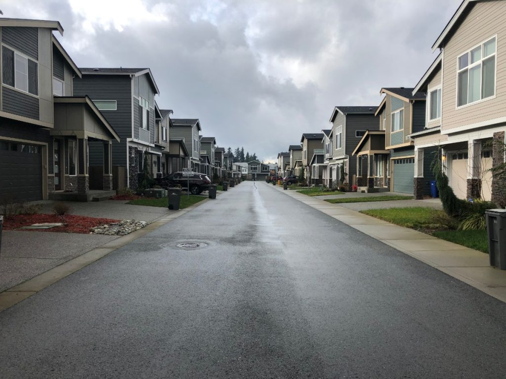 Snohomish County suburban sprawl. A view of 192 Place SE located within the unincorporated Bothell urban growth area. This is one of many private streets in this development, a mechanism that allows for the construction and upkeep of the road to be placed on homeowners associations instead of a municipality. (Photo by Ray Dubicki)
