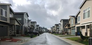 Snohomish County suburban sprawl. A view of 192 Place SE located within the unincorporated Bothell urban growth area. This is one of many private streets in this development, a mechanism that allows for the construction and upkeep of the road to be placed on homeowners associations instead of a municipality. (Photo by Ray Dubicki)