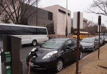 Why Washington Should Require All New Cars Sold in State to be Electric by 2030 An electric car charging outside a museum. (Credit: Slowking4, Wikimedia Commons)