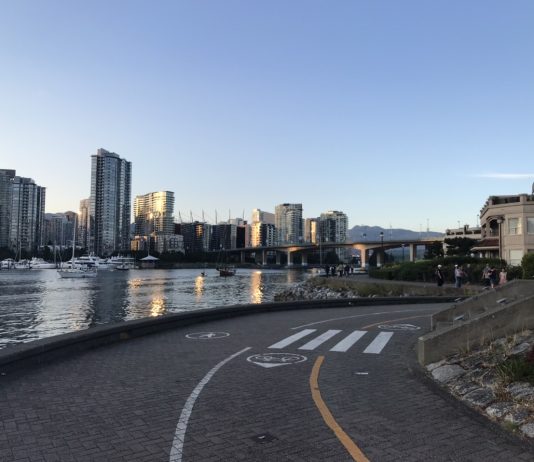 What We’re Reading: Solvable, 15-Minute City, and FBC False Creek waterway and embankment in Vancouver, British Columbia.