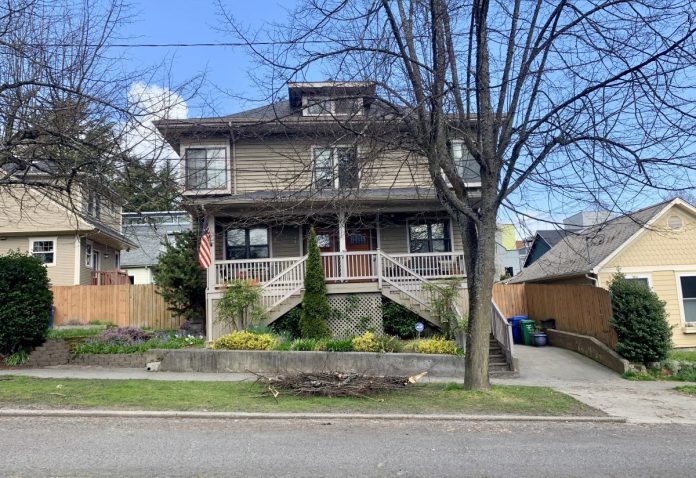 Look carefully, what appears to be a single family residence here is actually a duplex. (Photo by author)