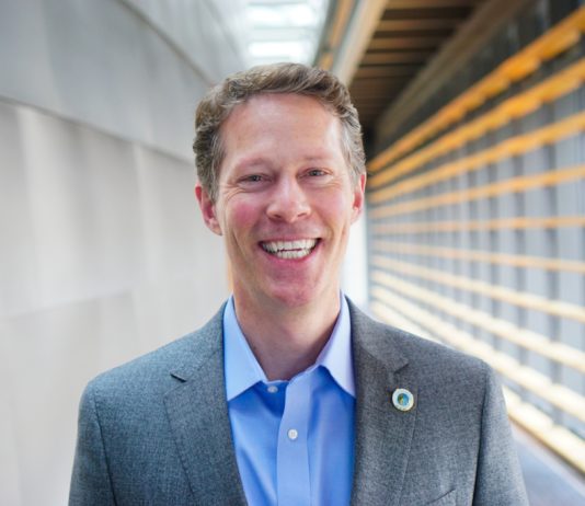 Alex Pedersen Not Seeking Second Term on Seattle Council Alex Pedersen poses in a suitcoat in a City Hall hallway