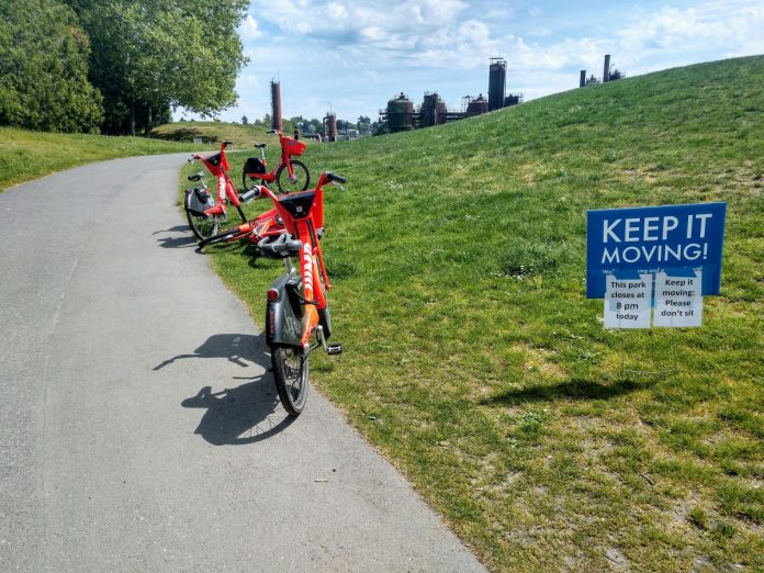 JUMP bikes became unrentable on Friday even there still littered about such as here at Gas Works. (Photo by author)