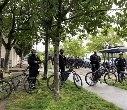 Consent Decree Judge Contemplates Police Reform under a New City Attorney Police gathered in large numbers to ensure houseless were swept and cleared in rapid fashion with no interruption from encampment residents or their allies. (Photo by Enrico Doan)