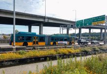 Metro Planning 15% Service Cut This Fall, Fares Returning in July Metro heads toward West Seattle via Spokane Street low bridge. (Photo by Doug Trumm)