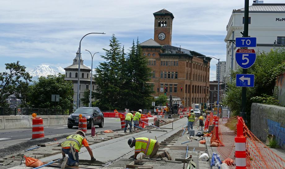 Trackbed installation for the streetcar on S Stadium Way. (Sound Transit)