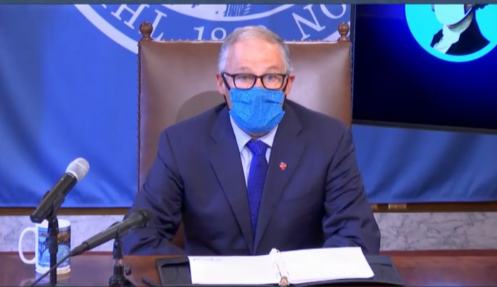 Governor Jay Inslee wears a mask at July 23rd press briefing. (Screen capture via TVW)