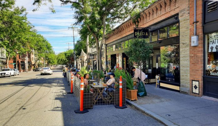 Patrons eat in a new parklet patio at Gracia in Ballard. (Photo by Doug Trumm)