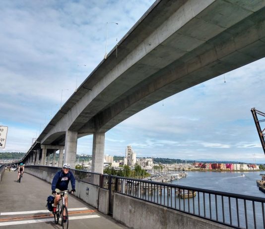 The Urbanist’s Greatest Hits of 2020 People bike on the low bridge with the cracked high bridge looming overhead. (Photo by Doug Trumm)
