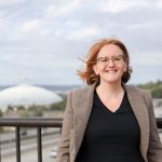 Rebecca Parson with the Tacoma Dome in the background.