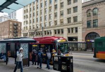 Fast, Frequent Transit Would Drive Ridership Rebound, Commute Seattle Survey Shows Riders board the RapidRide E, which gets a big boost from the STBD, on Third Avenue in Downtown Seattle. (Photo by Doug Trumm)