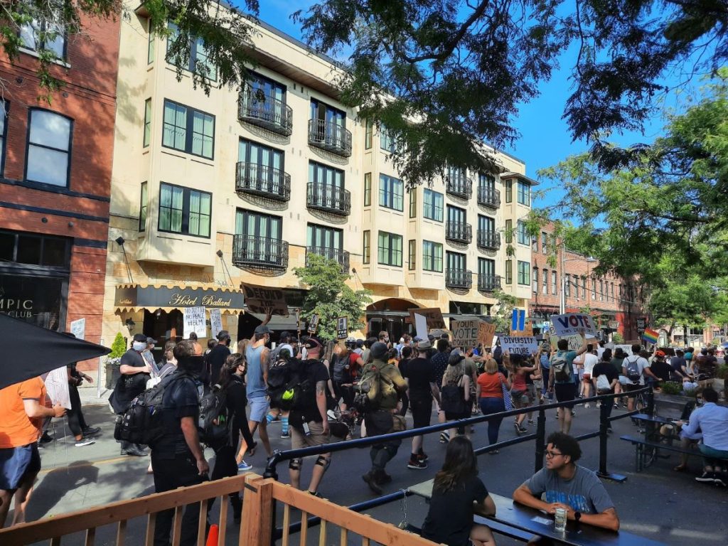 Hundreds of Black Lives Matter protesters march on Ballard Avenue.