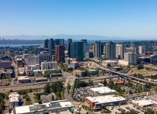 Bellevue Weighing Options for New I-405 Interchange in South Downtown Downtown Bellevue viewed from the east with I-405 chasm setting off Wilburton. Seattle skyline and Lake Washington in the background. (