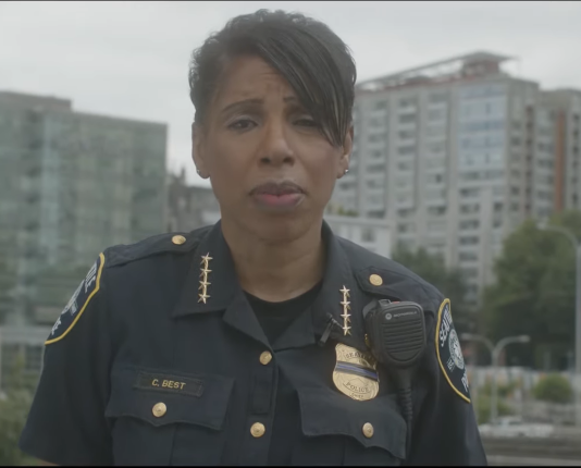 Chief Best Resigns After Seattle Council Trims 100 Police Officer Positions Chief Best with a Downtown Seattle buildings and street behind her. Video is here: https://www.seattle.gov/police/together