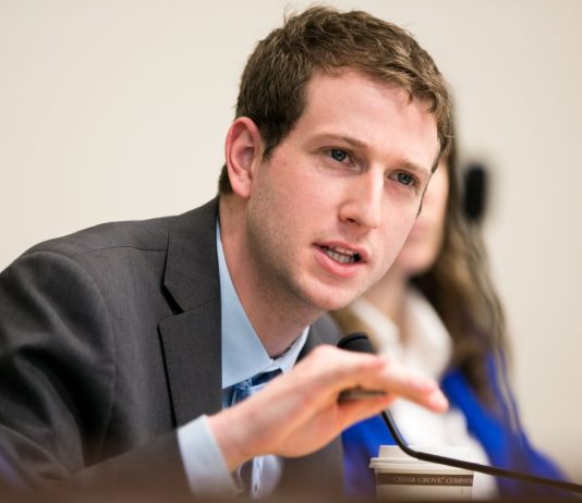 2020 Endorsement Questionnaire: Joe Fitzgibbon, LD34-2 Picture of Joe Fitzgibbon making a hand gesture at a hearing. (Credit: Washington State Legislature)