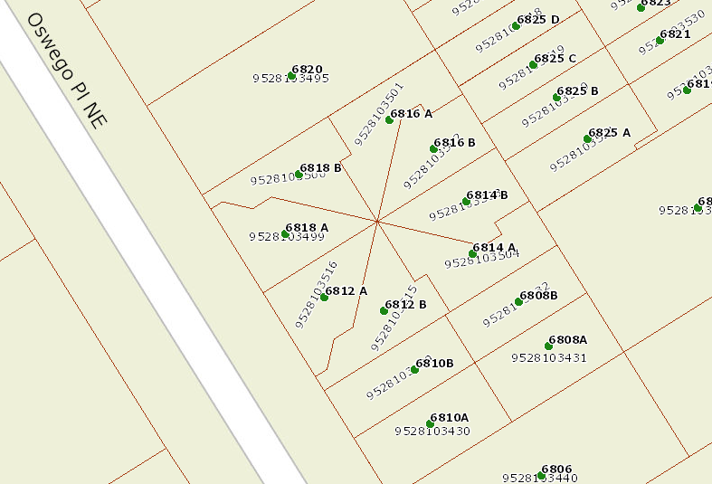 If you tried to cut a square pizza like a circle pizza but used dull scissors to do it, you'd end up with these 8 lots meeting in the middle on Oswego Pl NE.