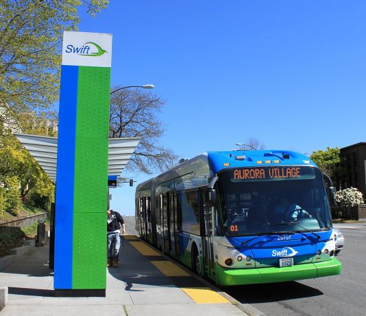 Community Transit Charts Two Service Recovery Paths A Swift station with a bus waiting.