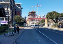 City Council Greenlights Scootershare Pilot, Pedersen Dissents Three scooters on a sidewalk in Austin, Texas.