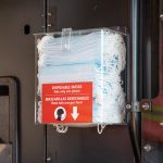 New face mask dispenser on a Metro bus for use by riders. (King County)