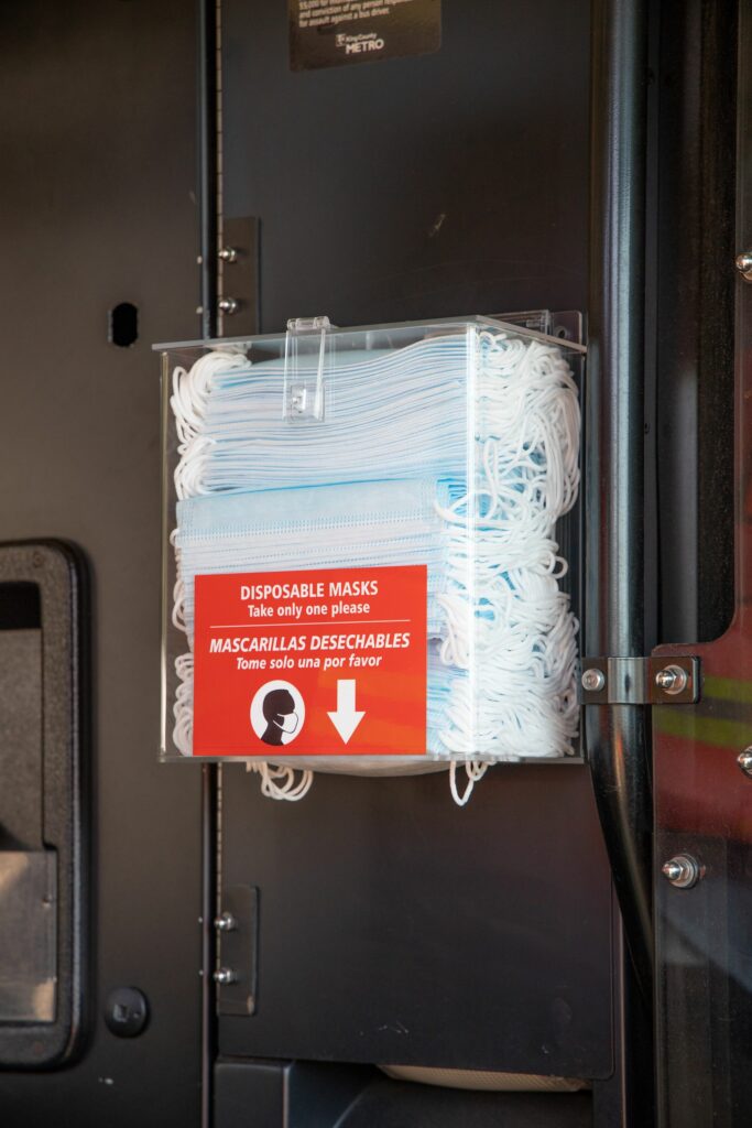 New face mask dispenser on a Metro bus for use by riders. (King County)