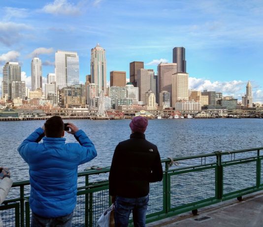 Spring Subscriber Drive Recap and Thank You Downtown Seattle skyscrapers seen from a ferry in Elliott Bay