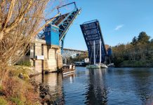 Mosqueda’s Budget Balancing Package Advances Progressive Priorities and Bridge Maintenance Bonds The Fremont Bridge goes up to let a catamaran pass.