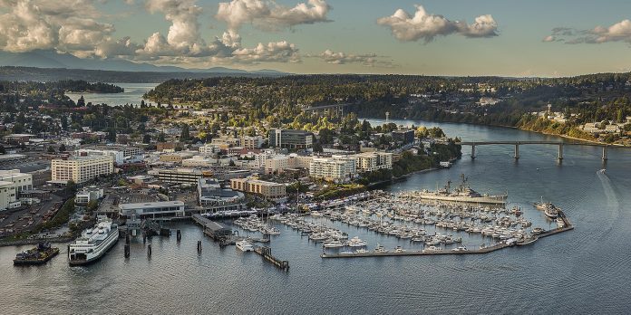 Bird's eye view of downtown Bremerton with the marina and some midrise buildings in the foreground.