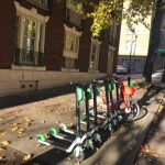 Lime scooters on street by Stephen Fesler
