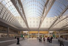 Torpedoing NYC Decongestion Tolls Would Be National Setback An airy train station with a glass ceiling held by steel latticework.