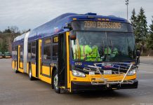 Metro’s Battery Bus Plan Hinges on Need to Grow Service and Revenue A battery-powered bus during a press event.