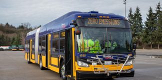 A battery-powered bus during a press event.