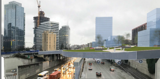 A park-like is shown over the freeway trench in this cross section.