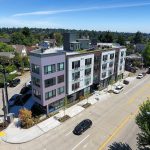 CREW Apartments Full Building Street Corner View