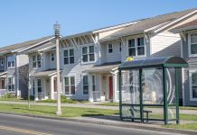 Tacoma’s Missing Middle Housing: Planning for Access, Affordability, and Mobility A rowhouse with a transit shelter.