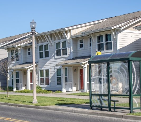 Tacoma’s Missing Middle Housing: Planning for Access, Affordability, and Mobility A rowhouse with a transit shelter.