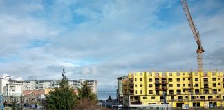 A large construction project near a roundabout in Tacoma.