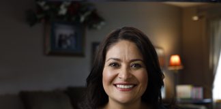 Lorena González smiling in a headshot photo.
