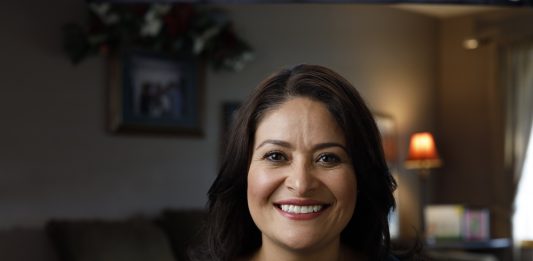 Lorena González smiling in a headshot photo.