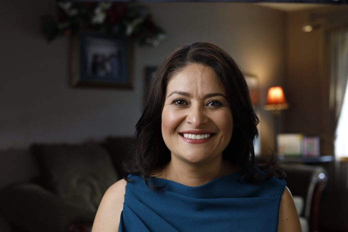 Lorena González smiling in a headshot photo.