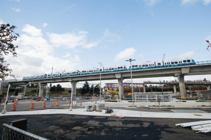 New elevated section of track near Northgate Station with light rail vehicle testing. (Sound Transit)