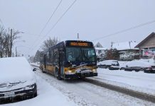 Metro Previews Policy Updates for System Growth and Equity Focus A Metro bus operating on a snowy Beacon Hill. (Owen Pickford)
