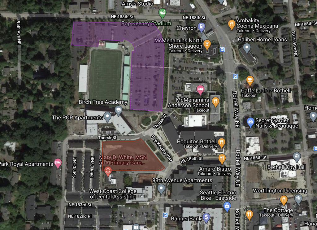 The area in red is the site that Sound Transit wants to put a parking garage on. The area in purple is existing parking for Pop Keeney Stadium. (Google Maps)