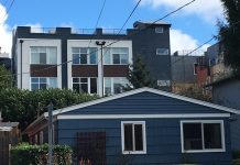 Wallingford Must Not Neglect Its Present or Its Future as It Celebrates the Past Photo of a single-story duplex in Wallingford, with three-story townhomes behind it.