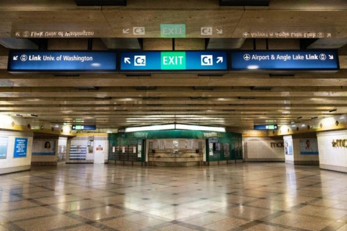 Mockup of what new overhead wayfinding signs will look like at Westlake Station. (Sound Transit)