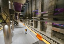 Sound Transit 3’s Affordability Gap Shrinks to $7.9 Billion, So What’s Next? A construction stands on the underground station platform at Roosevelt Station.