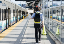 Mid-Year Service Changes Lead with Link Light Rail Frequency Improvements A Link train waiting at a platform. (Sound Transit)